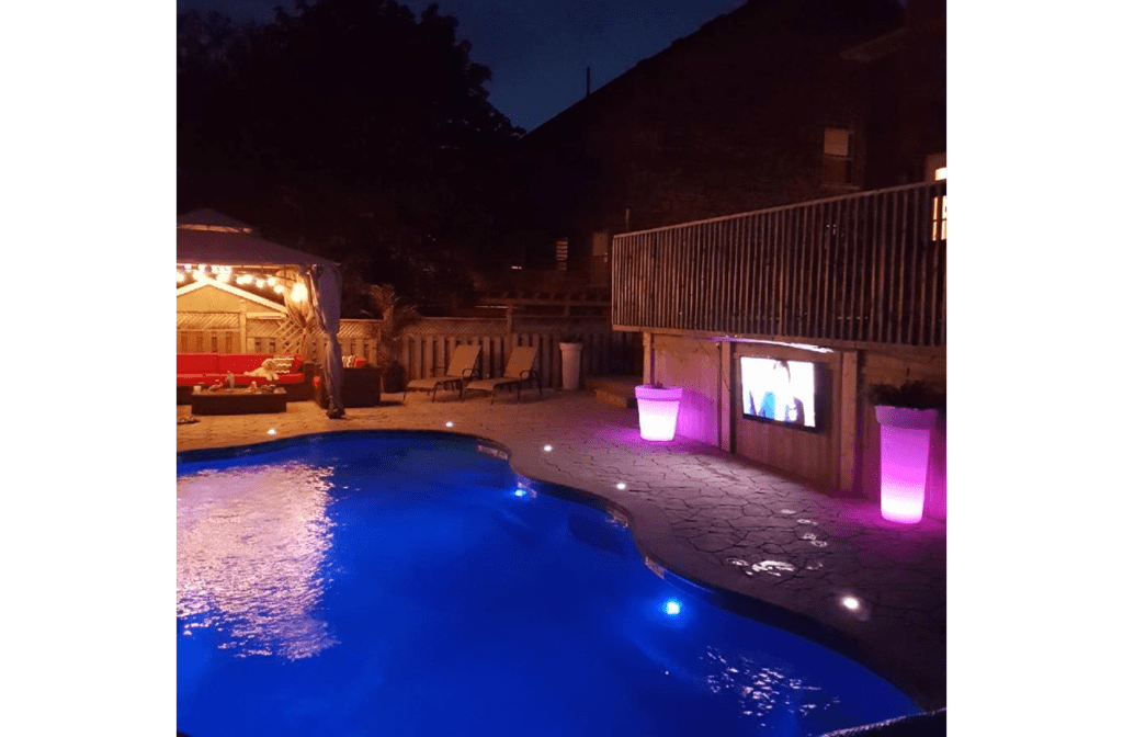 Curved inground pool with lights